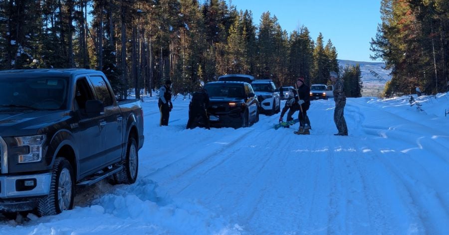 <who> Photo Credit: Contributed</who> Vehicles stuck on the 201 Forest Service Road during the winter.