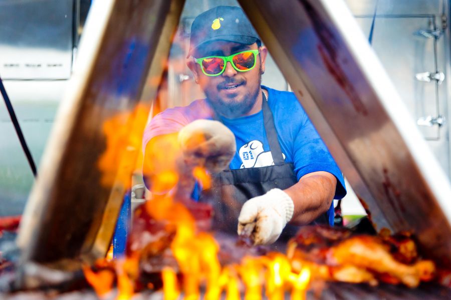 <who> Photo Credit: PentictonNow/Gord Goble </who> Ribbers cooking up a feast at a previous RibFest.