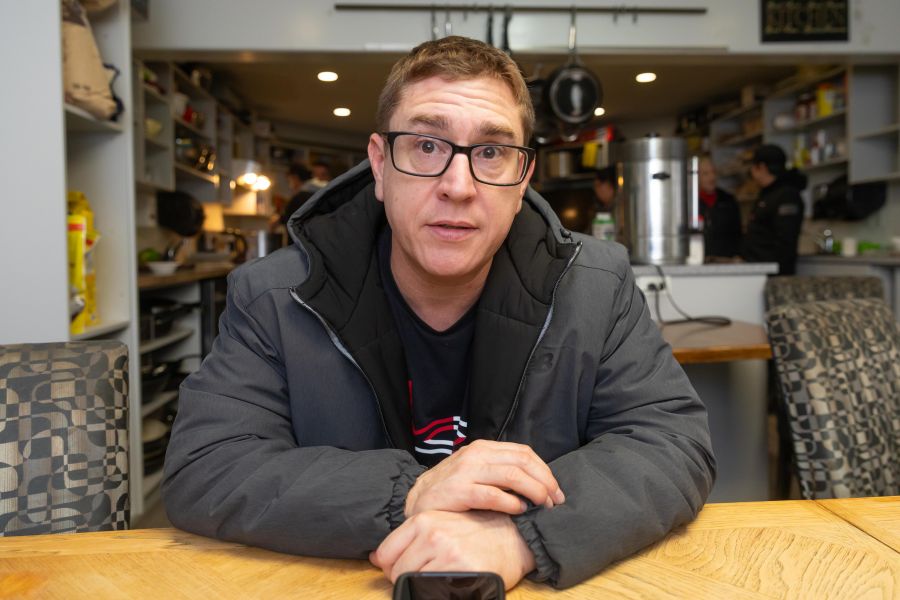 <who>Photo Credit: NowMedia/Gord Goble</who> Happy client Stephen Bradley tells his story at the open house