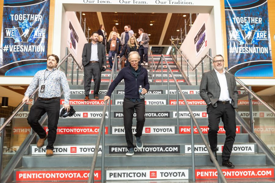 <who>Photo credit: NowMedia/Gord Goble</who> Graham Fraser (centre) walks the SOEC steps post-announcement