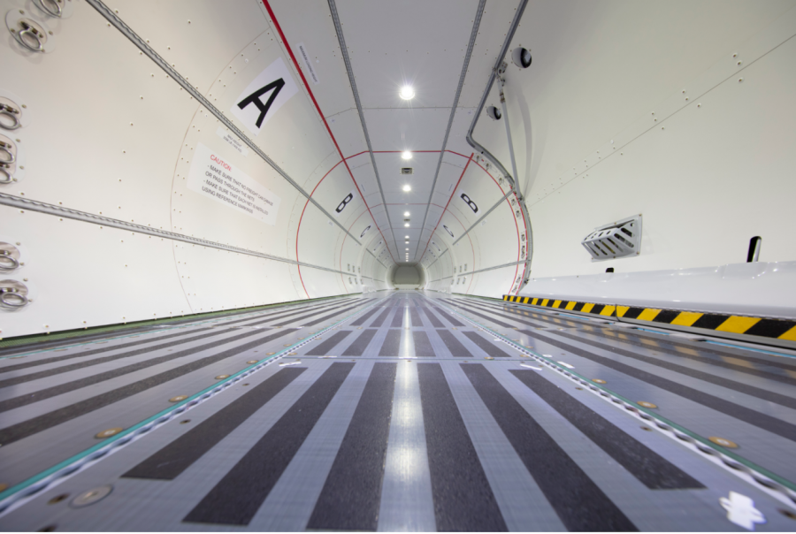 <who>Photo credit: KF Aerospace</who>The hold of the ATR plane is wide open to haul containers and bulk cargo.