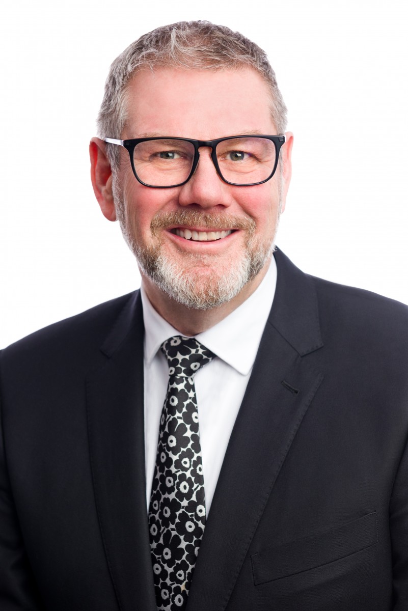 <who>Photo credit: Kelowna International Airport</who>Geoff Richie is the acting CEO at Kelowna International Airport.