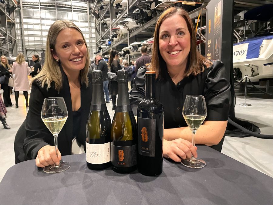 </who>Photo credit: Steve MacNaull/NowMedia Group</who>Winemaker Kailee Frasch, left, and BACAS Wines CEO Jenn Cudlipp at the launch party at Aqua Boat Club.