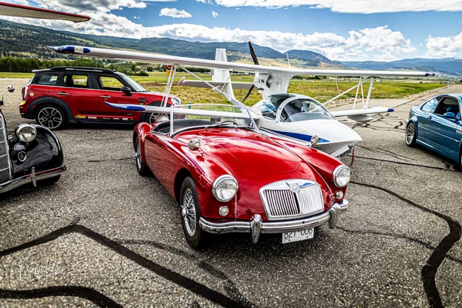 <who>Photo credits: Deans Lens</who>A classic MG with the Super Petrel, above. Below, the Super Petrel with a Victory motorcycle and classic VW bug.