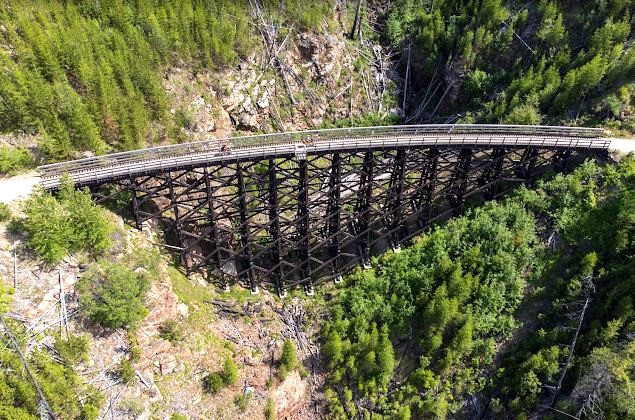 </who> A photo of a portion of the famed trestle hiking and biking trail at Myra-Bellevue Provincial Park in Kelowna by Google Maps user Tom Mutton.