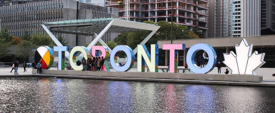<who>Photo credits: TripAdvisor and Wikipedia</who>Toronto, above, is the most famous such sign in a Canadian city.  Iamsterdam, below, is considered the first such city-identifying selfie sign dating back to 2004.