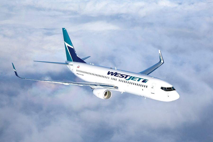 <who>Photo credits: WestJet</who>WestJet flies an array of Boeing 737 jets, above, and Q400 turbo-propeller planes, below, in and out of Kelowna International Airport.