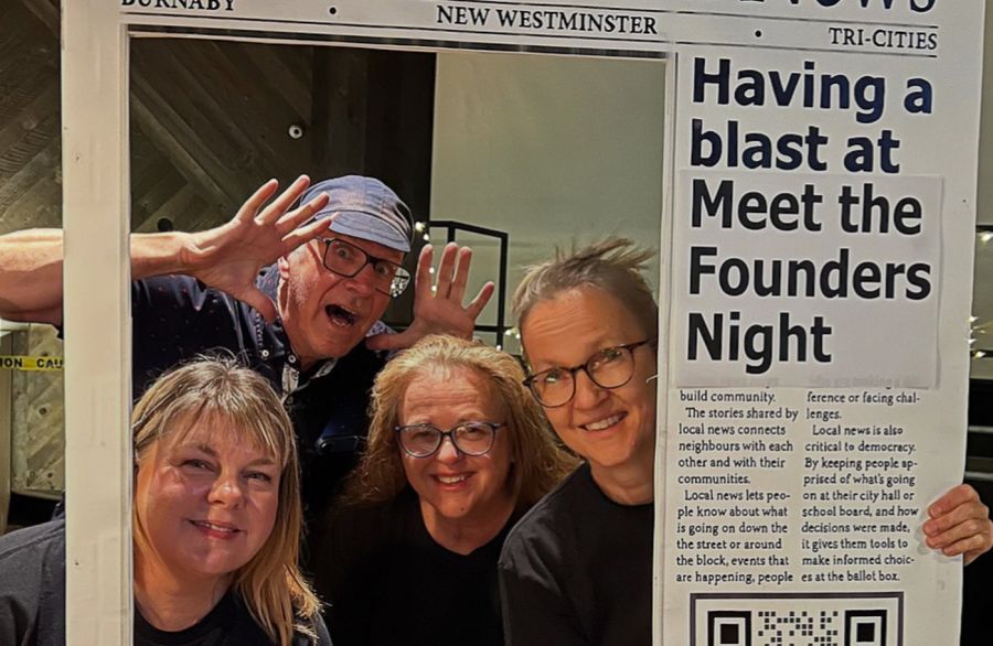 <who> Photo Credit: Patrick Penner, Local Journalism Initiative Reporter</who>Left to right: Reporters Janis Cleugh, Mario Bartel, Theresa McManus, and Cornelia Naylor smile for front-page photo cutout board.