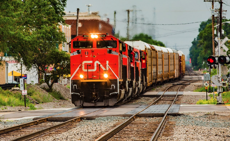 <who> Photo credit: CN </who> A stock image showing a CN train.