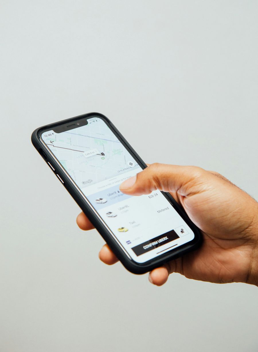 <who>Photo credit: Charles Deluvio on Unsplash</who>Check first to see if ride-hailing or a taxi is cheaper for your trips to and from Kelowna airport.