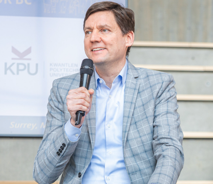 <who> Photo credit: Government of BC </who> Premier David Eby, who said his government must be "nimble" in the face of threats from south of the border.