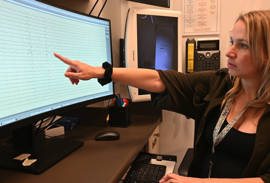 <who> Photo credit: LJI/The Tyee </who> Each MEG sensor’s reading is represented by a line wobbling across the screen.