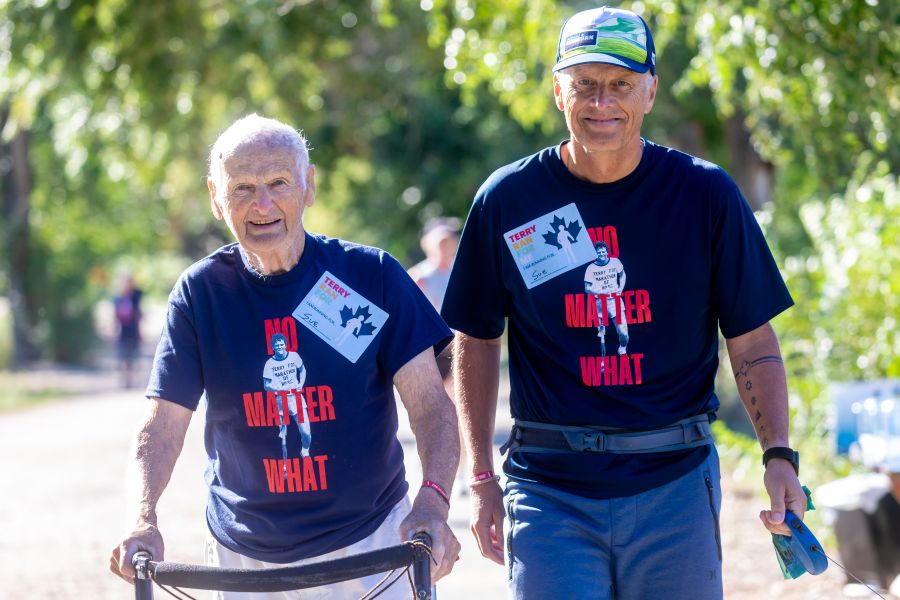 <who>Photo Credit: NowMedia/Gord Goble</who> Karl Mortensen with son Brian at Sunday's event