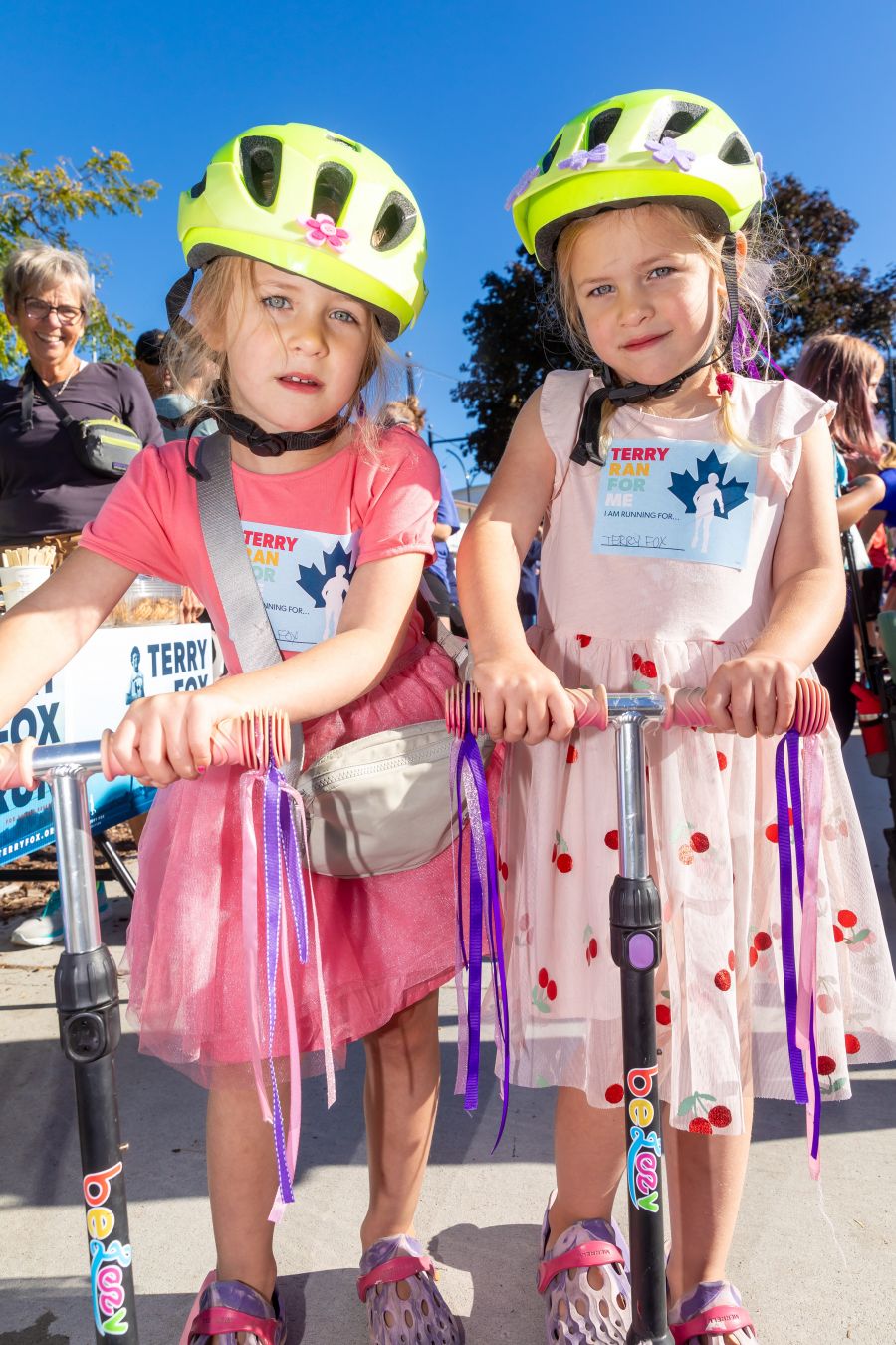 <who>Photo Credit: NowMedia/Gord Goble</who> Rowan and Emery brought their scooters to the 2024 Terry Fox Run