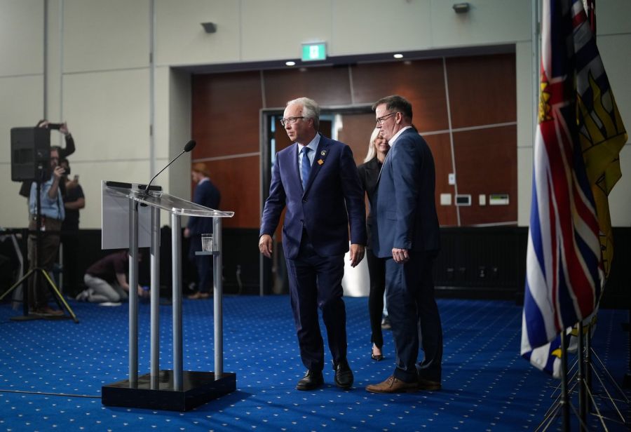 <who>Photo Credit: Canadian Press</who>John Rustad (L) and Kevin Falcon at a press conference where Falcon announced the suspension of BC United's campaign.