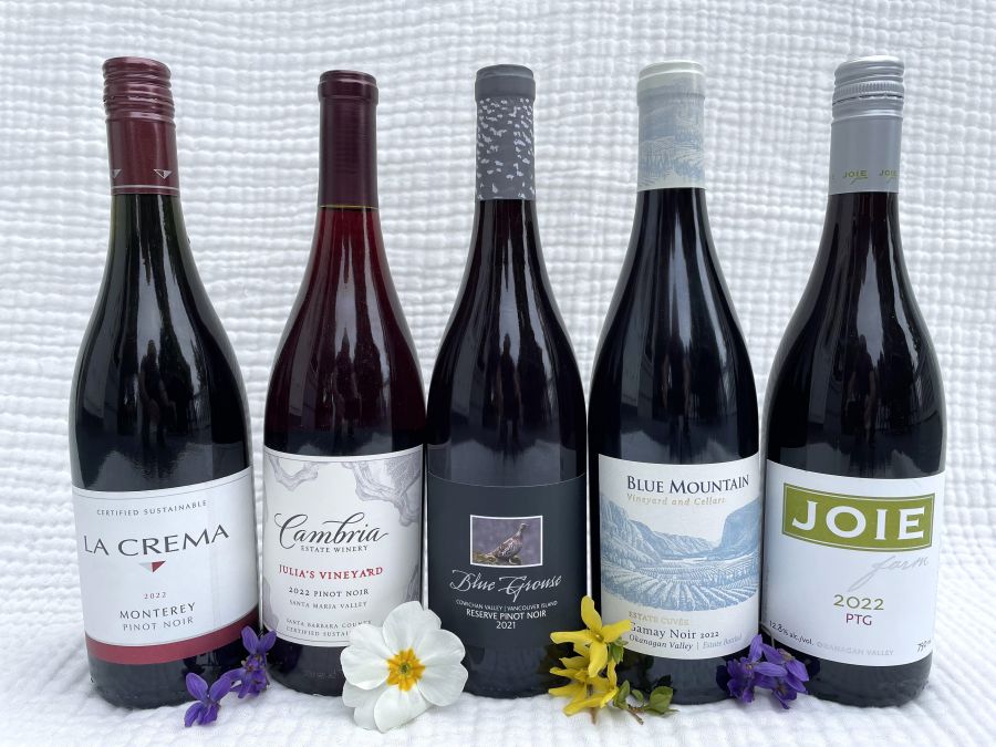 <who>Photo credit: Steve MacNaull/NowMedia Group</who>A line up of of five light red wines perfect for spring and summer sipping. From left, La Crema 2020 Monterey Pinot Noir ($33), Cambria Julia's Vineyard 2022 Pinot Noir, Blue Grouse Cowichan Valley 2021 Pinot Noir ($39), Blue Mountain Estate Cuvee 2022 Gamay Noir ($30) and Joie Farm 2022 PTG ($30).