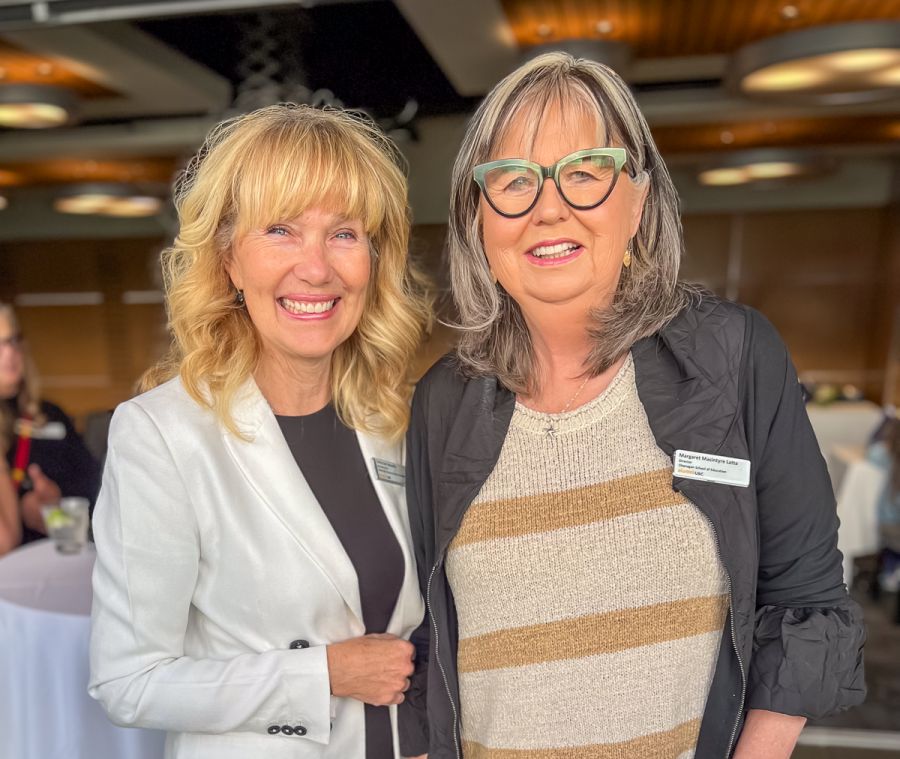 <who>Photo Credit: SD23</who>Terry-Lee Beaudry (left) Deputy Superintendent of Schools and Margaret McIntyre Latta, Director of the UBC-Okanagan School of Education, at the ceremony for the UBC Alumni Builder Award.