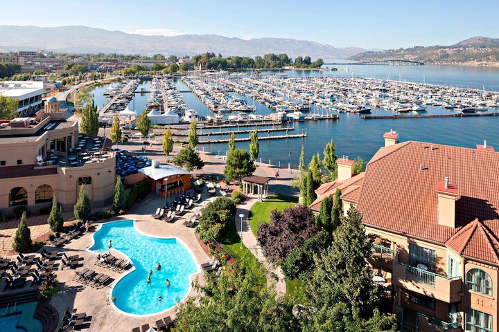 <who>Photo credit: Marriott</who>The view of the hotel pool and Kelowna Yacht Club from a Delta Grand room.