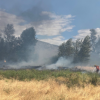 <span style="font-weight:bold;">UPDATE:</span> Osoyoos grass fire believed to be started by lawn mower destroys home, cars