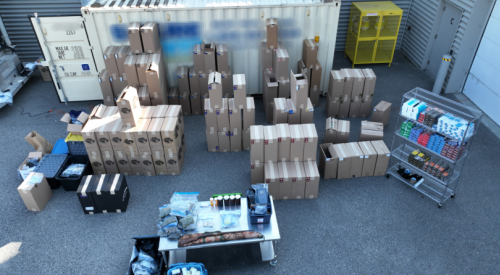 Kelowna RCMP confiscate 1.48M cigarettes, drugs and firearm during raid